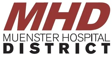 A red and white logo for monster hospital strike.