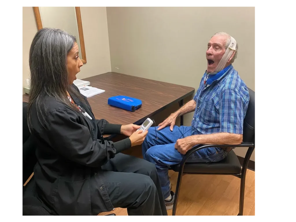 A woman and a man during a medical exam.